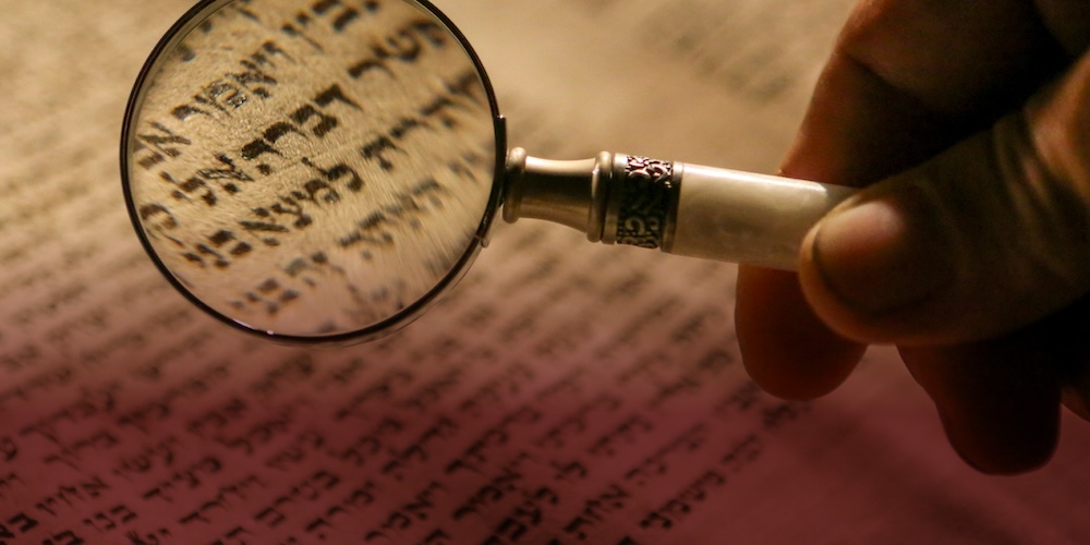 Magnifying glass used to view ancient text